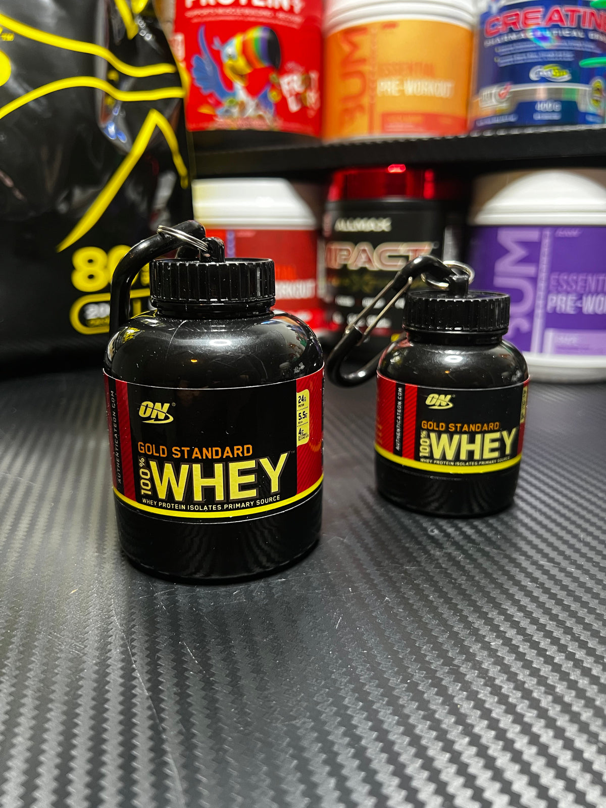 Mini Powder Jar next to full size whey tub