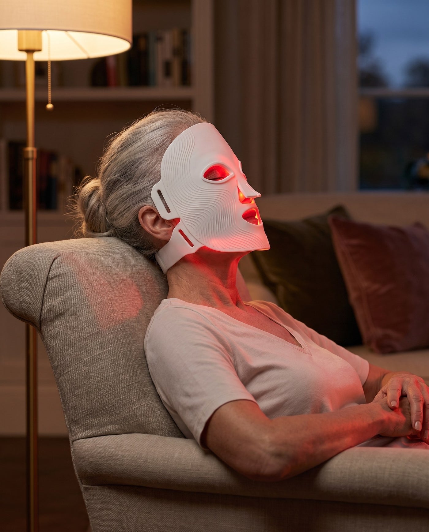 Woman wearing the Aeon LED face mask