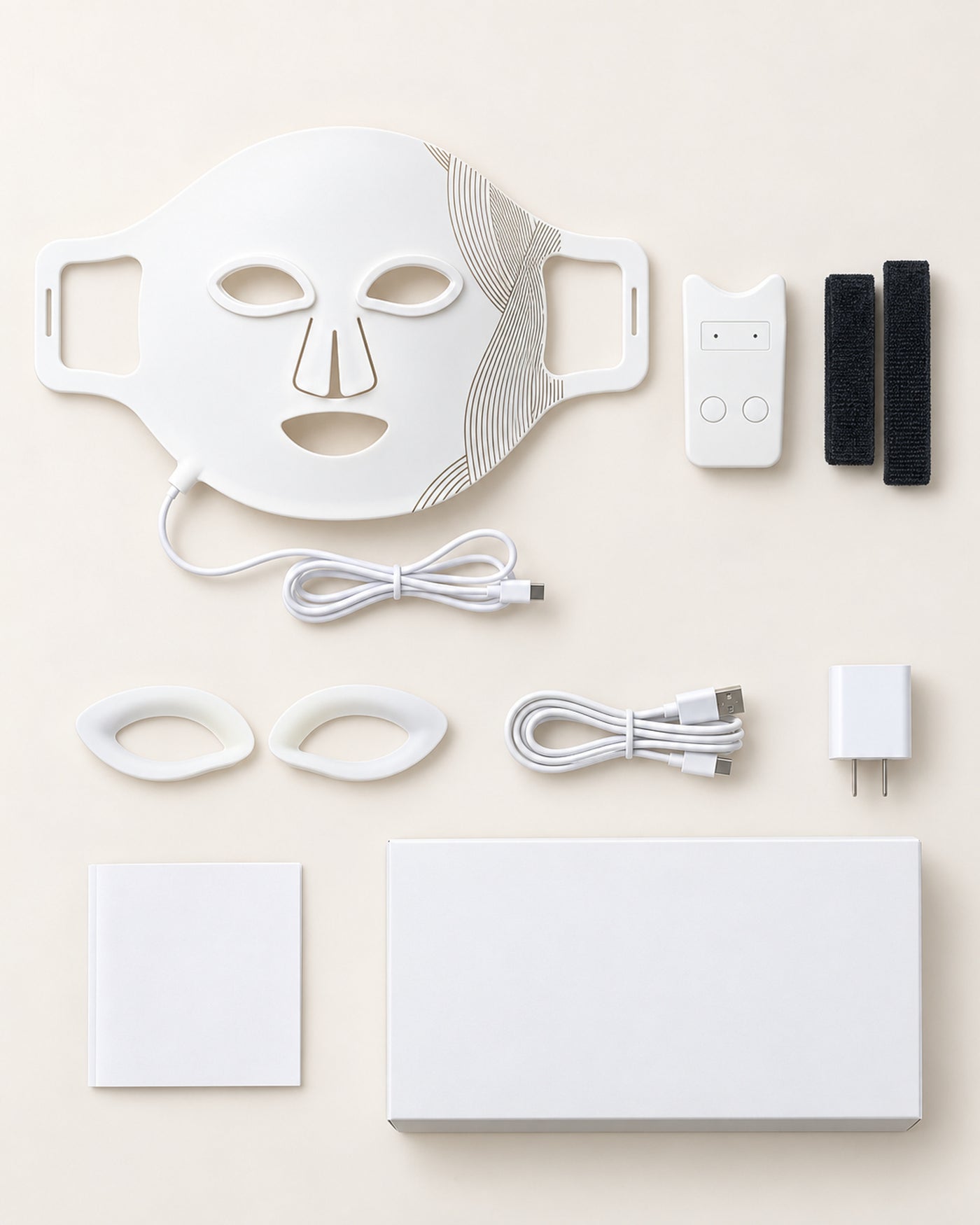 White LED Face Mask with controller, straps, eye inserts, charging cable, guide and box